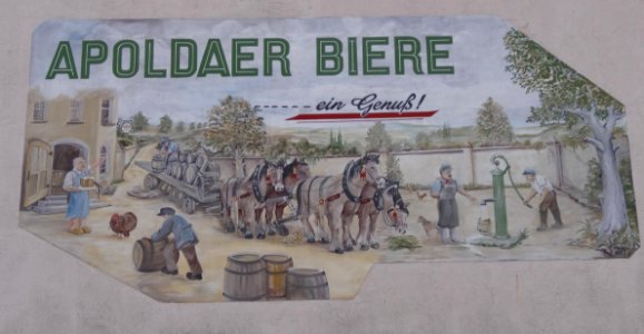 Werbung an einer Hauswand in Niederreißen