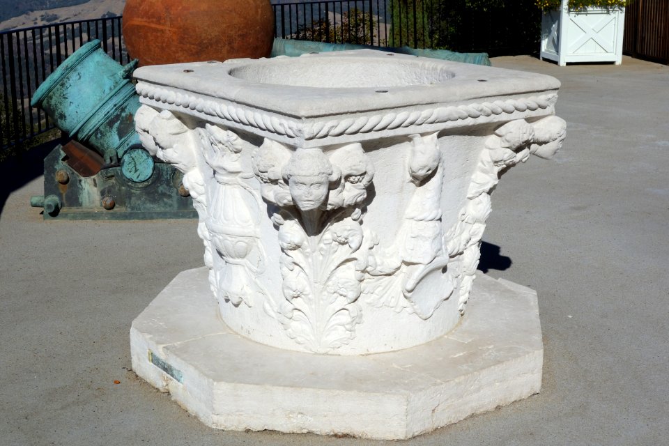 Well head with reliefs of heads springing from acanthus leaf sprays, Italy, 15th century - Hearst Castle - DSC06634