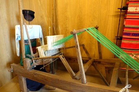 Weaver and loom, Muong - Vietnam Museum of Ethnology - Hanoi, Vietnam - DSC02730 photo