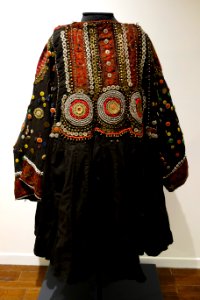 Wedding dress (jumlo), Indus Kohistan, Northwest Frontier Province, Pakistan, view 1, mid 20th century, cotton, metal and glass beads, plastic buttons - Textile Museum of Canada - DSC00936