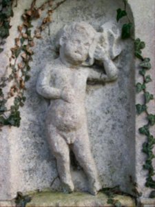 Weeping putto, Holywell, Cambs