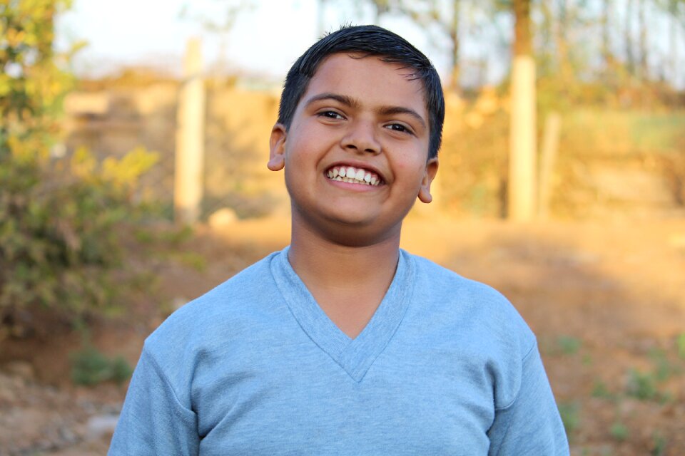 Expression 12 year boy happy