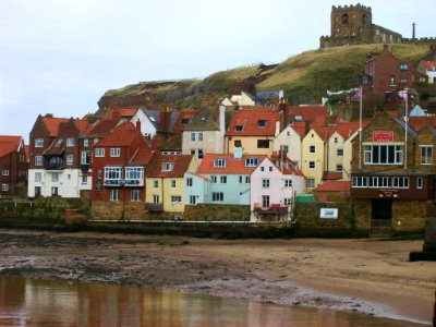 Whitby harbour with St Mary's church behind photo
