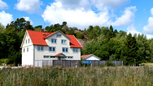 White house by road 162 in Häggvall photo