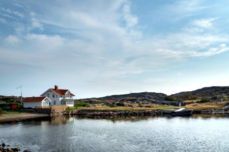 White house with a small beach in Norra Grundsund 3