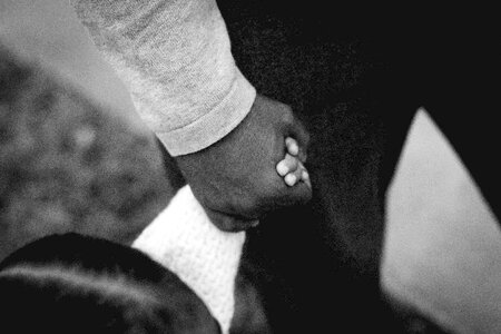 Holding hands black and white