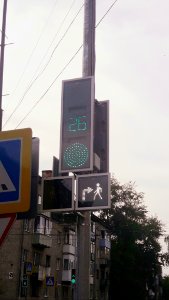 White traffic light with arrow