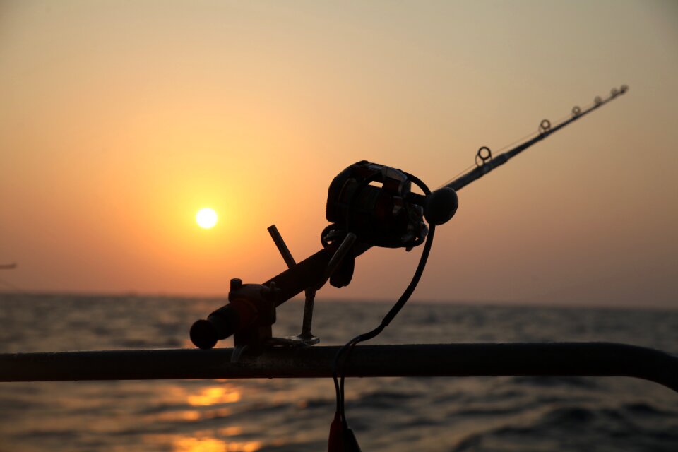 Electric drill sunset sea