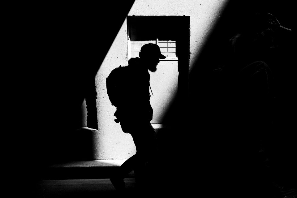 Guy walking silhouette photo