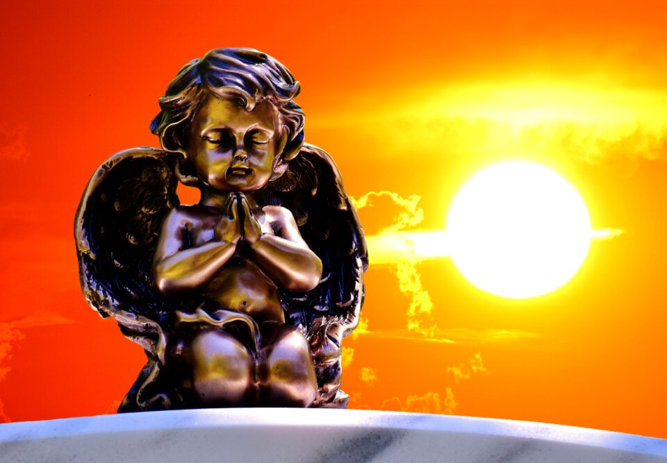Guardian angel pray sculpture