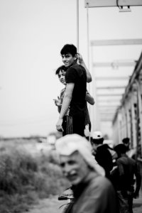 Young men gathered at Mosul's "Old Bridge" over the Tigris River in summer of 2019 to jump into the water and escape summer heat 23
