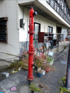 Yuzawa onsen street near skiing front- fire pole with multiple heights for snow