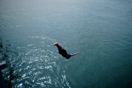 Young men gathered at Mosul's "Old Bridge" over the Tigris River in summer of 2019 to jump into the water and escape summer heat 16