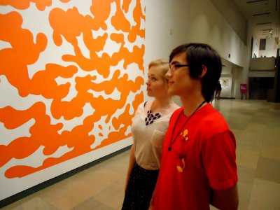 Young couple looking at painting Phoenix Art museum photo