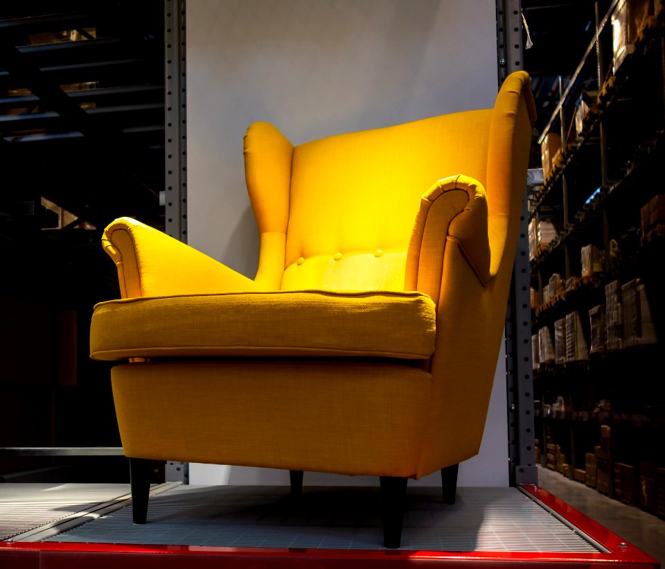 Yellow upholstered armchair in IKEA Torp Uddevalla