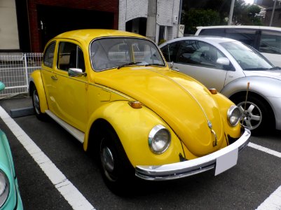 Yellow VolksWagen TYPE 1 front