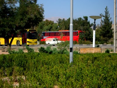 Yellow Bus for an Organization - Road 44 east of Iran - near Simorgh Culture house - Nishapur 3 photo