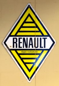 Yellow Renault régie nationale, Enamel advert sign at the den hartog ford museum pic-028