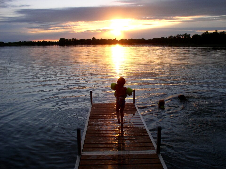 Swimming summer sunset
