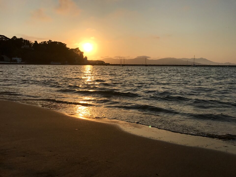 Bay sunset waves