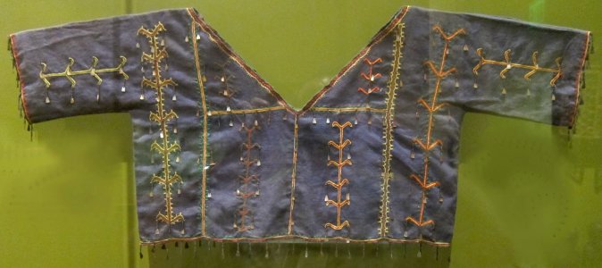 Woman's shirt from northern Luzon, 20th century, cotton, metal, shells, plain weave, Honolulu Museum of Art