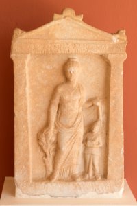 Woman and boy funerary stele Eretria Greece photo