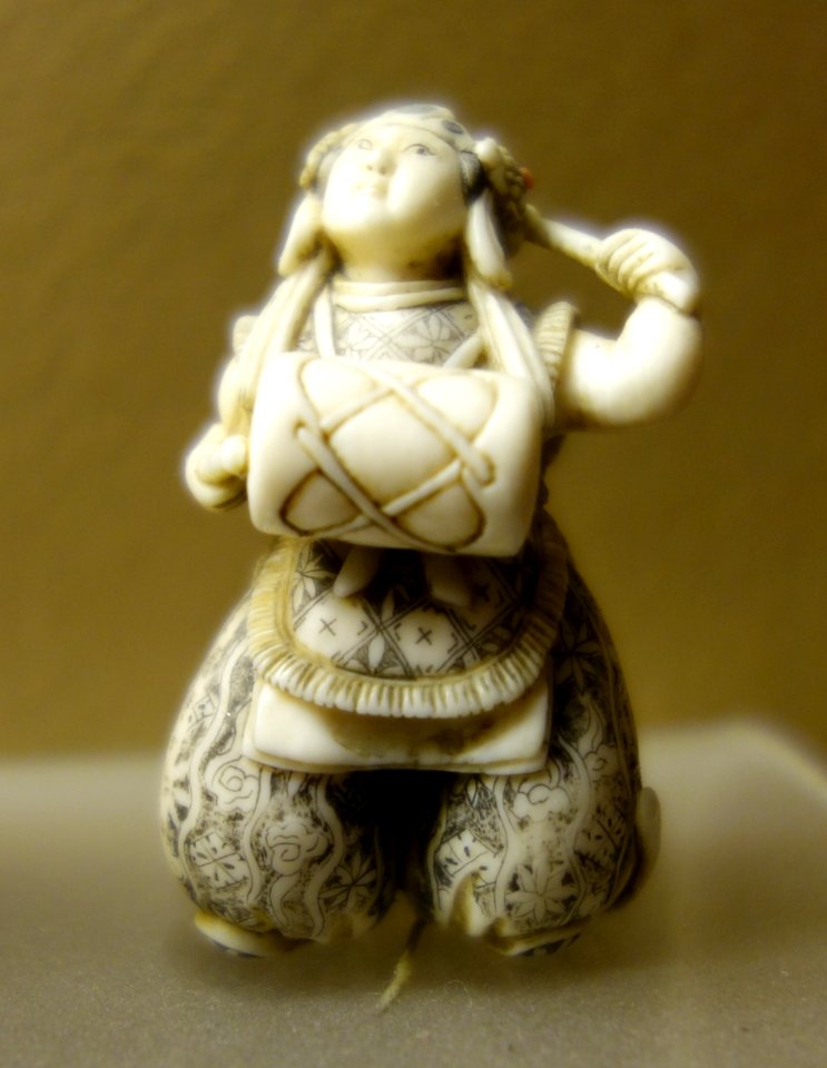 Woman drummer netsuke - Fairbanks Museum and Planetarium - DSC04352