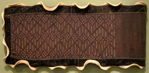 Woman's ceremonial overskirt, Kuba kingdom, mid-20th century, raffia palm fiber, plain weave, cut-pile and openwork embroidery, HMA