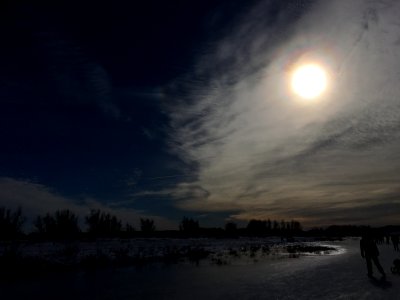 Winter riverscape with parhelion