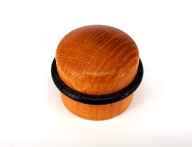 Wooden doorstop with rubber band and invisible screw