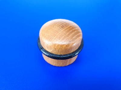 Wooden doorstop with rubber band and invisible screw - on Blue plastic