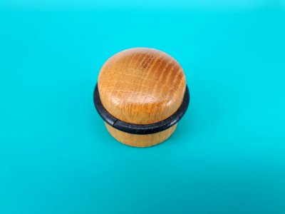 Wooden doorstop with rubber band and invisible screw - on Aqua Deep plastic