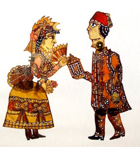 Woman with Celebi, the dandy, carrying a cage, Karagoz, Turkey - Museu do Oriente - Lisbon, Portugal - DSC06814