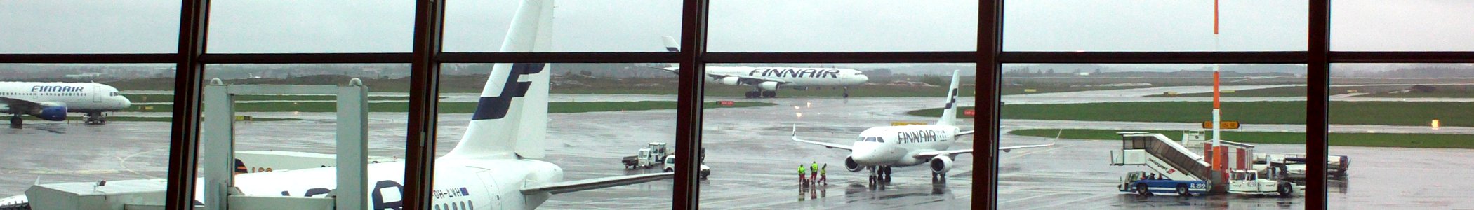 WV banner Helsinki Airport Finnair planes photo