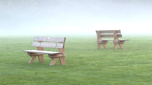 Benches in the mist in soccer training field 3 photo