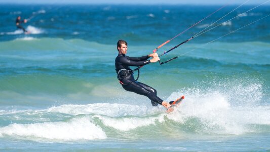 Kite-surfing male action photo