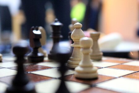 Chess pieces strategy playing field photo
