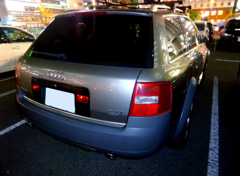 Audi Allroad quattro 2.7T (4BBESF) at night rear