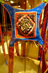 Baby carrier with lattice head support, embroidered with flowers and a butterfly, Hoklo - Hong Kong Museum of History - DSC00916