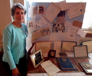 Capitola Dickerson memorial 11 piano student Leslie Carson with display
