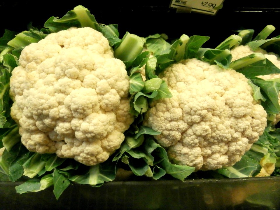 Cauliflower heads on a shelf
