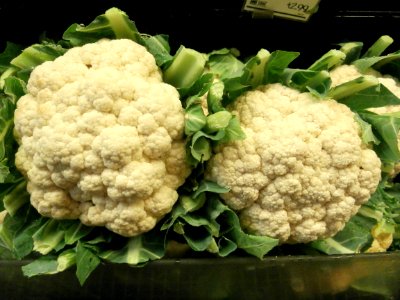 Cauliflower heads on a shelf photo