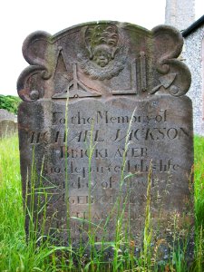Blakeney, St Nicholas, bricklayer's gravestone