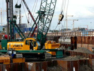 Building cranes and earthworks between Amsterdam Central Station and the waterfront of the IJ, 2006 photo