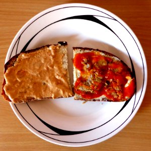 Buttered-bread-with-fish-and-spread photo