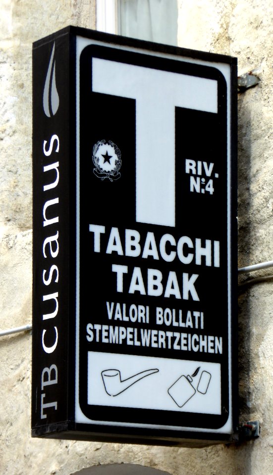 Zweisprachiges Trafikschild in Brixen, 2