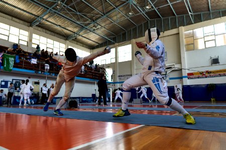 2nd Leonidas Pirgos Fencing Tournament. Matthew Baker performs a flèche against Nikolaos Tsokas