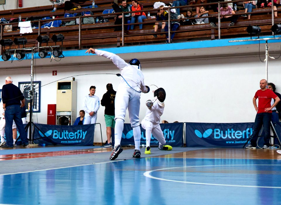 2nd Leonidas Pirgos Fencing Tournament. The fencer Stergios Delis performs a lunge and scores a touch