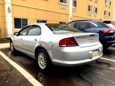 2005 Chrysler Sebring in Brilliant Silver Metallic, rear left, 5-29-2021