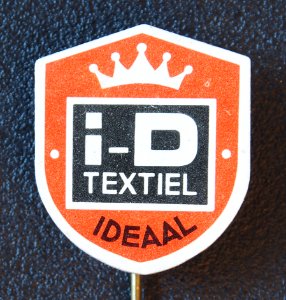 I-D textiel, reclame speldje